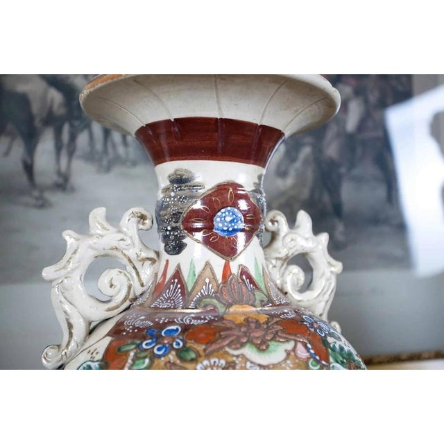 Hand-painted Japanese vase with a wizard motif. Detailed painting. Date: late 19th century. The vase is marked on the...