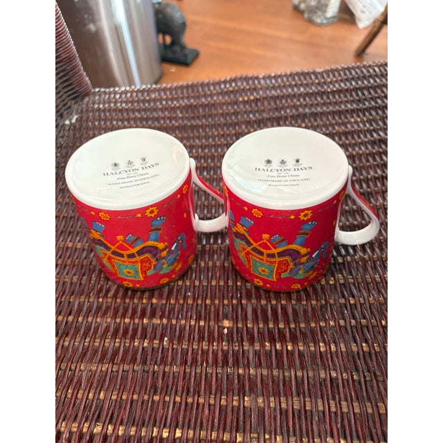 Halcyon Days Bone China Coffee or Tea Mugs- a pair in red with Indian elephants on them. Halcyon Days is a high end...