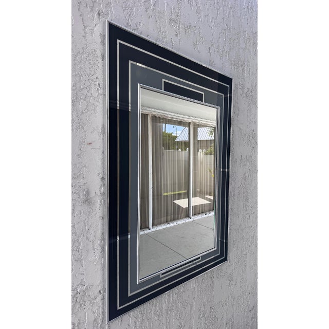 Mid-Century Modern Monochromatic-Toned Wall Mirror Offered for sale is a sleek monochromeatic wall mirror. from Gallery...