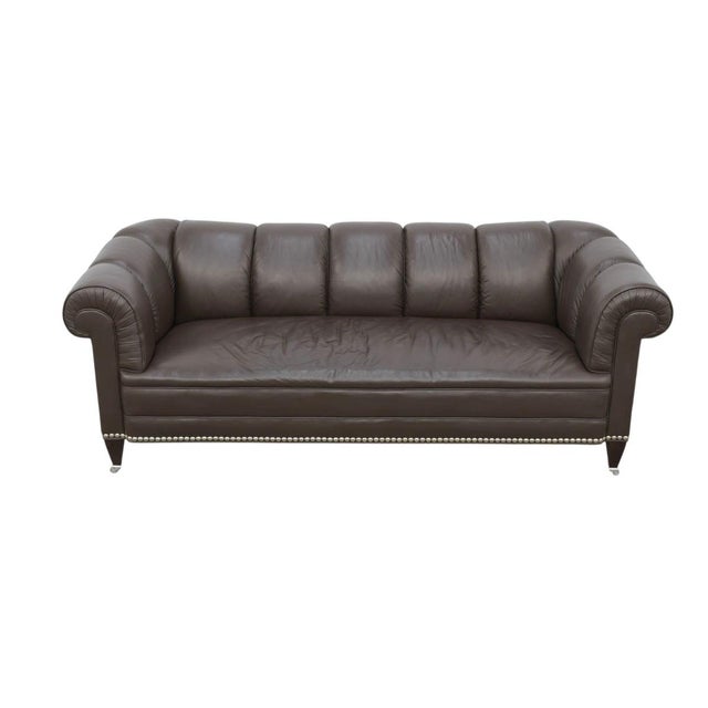 A refined interpretation of the classic Chesterfield, this Baker Furniture leather sofa combines traditional English...