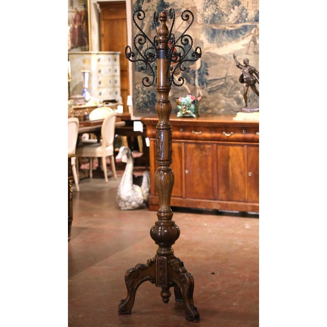 Bring elegant French craftsmanship and sculptural presence to an entryway, dressing room, or office with this handsome...