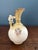 Description: Add a touch of turn-of-the-century Bohemian elegance to your shelf styling or porcelain collection with this...