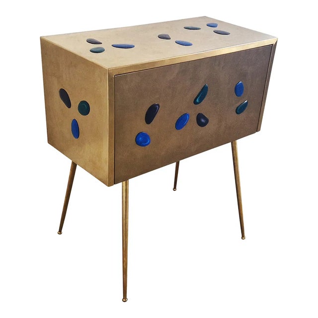 Brass console with one drawer with colored inserts. Dimensions (wxdxh) 70 x 35 x 80 cm