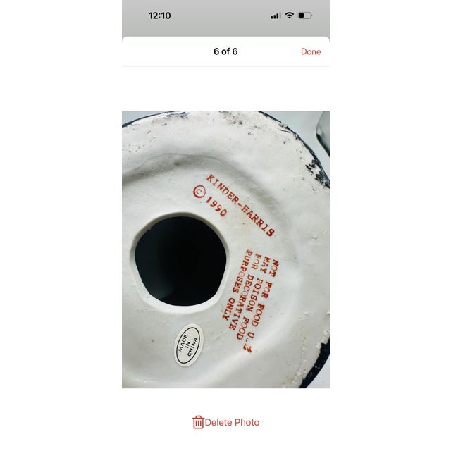 This is a ceramic rabbit figurine designed as a decorative container or candy dish. Description: • The piece features a...