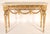 Antique Continental Louis XVI style gilt wood (gold leaf) console table with a white Carrara marble top, late 19th...