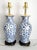 Offering a restored vintage blue and white hand painted Chinese porcelain table lamps, circa Mid 20th Century. The...