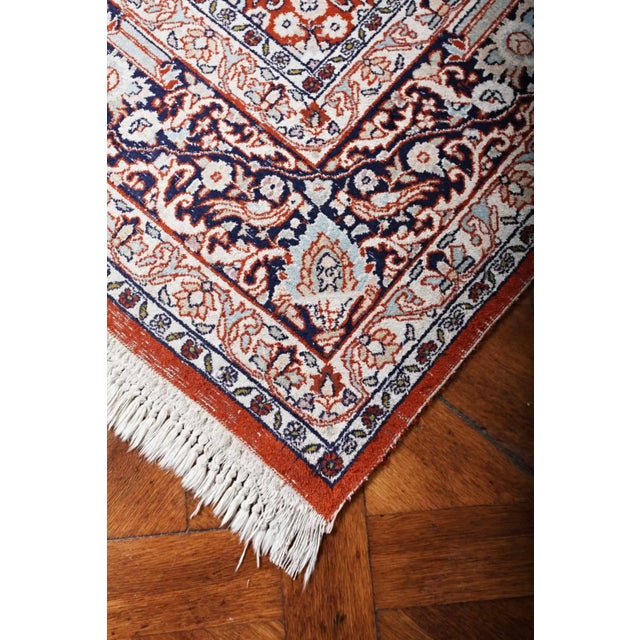 Hand-knotted silk rug from Kashmir. Silk on cotton warp. Fine weave with a density of around 360,000 knots per m2. The rug...