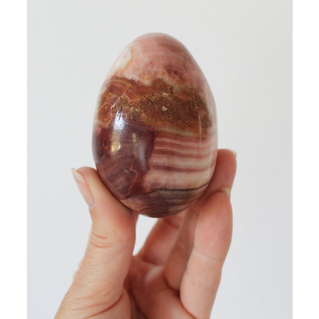 Set of seven polished marble stone eggs. No makers mark. Minor age wear.