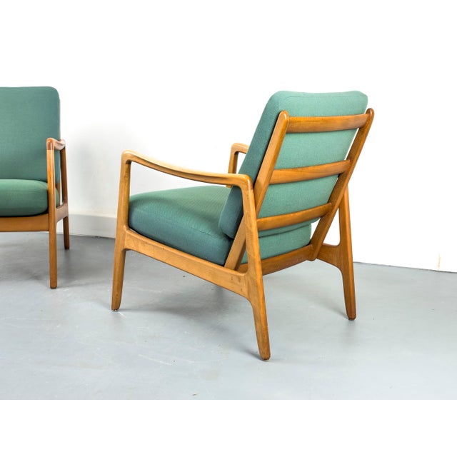 Rare set of two. Very early production of the FD-109 lounge chair, designed by Professor Ole Wanscher and manufactured by...