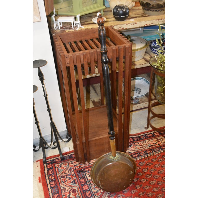 This bed warmer was purchased in the UK a long time ago. Copper end with 'hinged' lid. This has a simple punched/hammered...