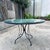 1970s Mid-Century Modern Woodard Style Black Wrought Iron Mesh and Glass Patio Dining Table For Sale In Palm Springs - Image 6 of 6
