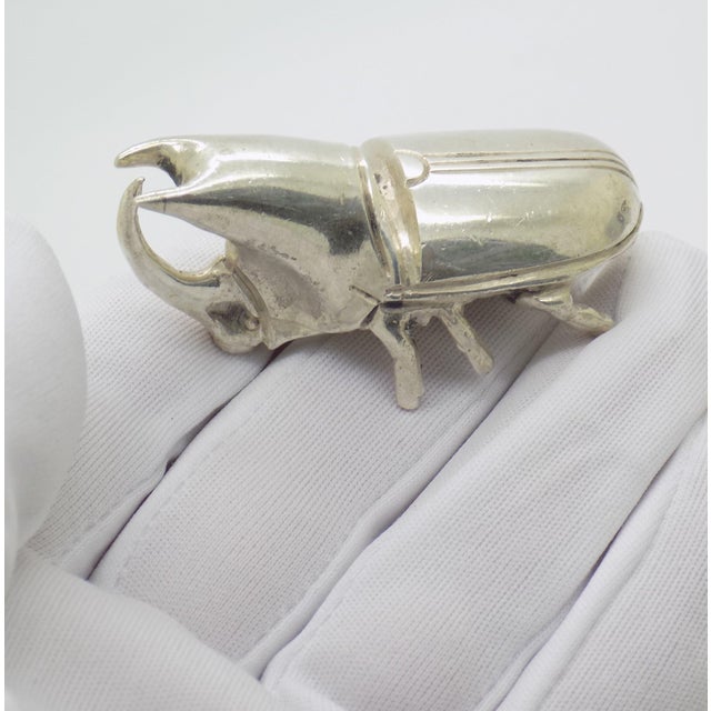 A distinctive statement piece for the discerning collector, this vintage solid silver sculpture captures the powerful form...