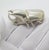 A distinctive statement piece for the discerning collector, this vintage solid silver sculpture captures the powerful form...