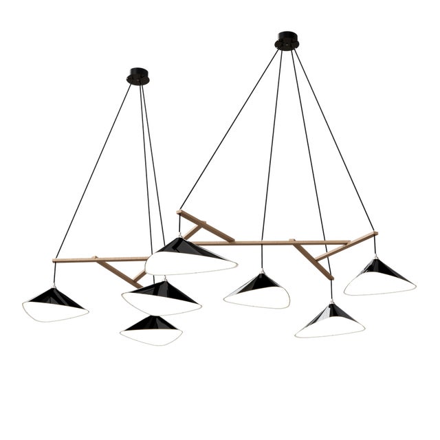 Emily is a series of handmade sheet steel lampshades in various finishes and spatial arrangements. _ Emily was inspired by...