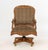 Louis XV Style Leopard Print Upholstered Walnut Swivel Chair, the frame ornately carved with shell and foliage motifs and...