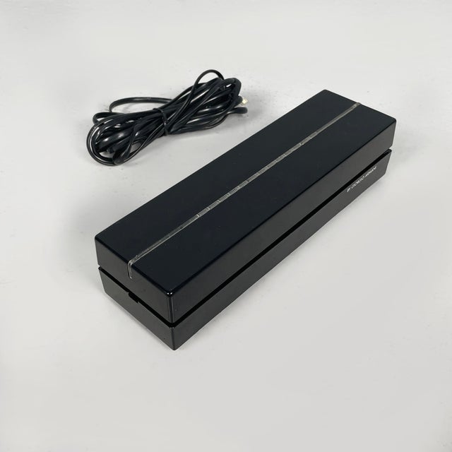 Italian modern black plastic telephone Notturno by Giorgio Armani, 1980s Notturno telephone with rectangular shape, made...