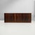 Italian wooden sideboard, 1970s Sideboard in dark wood, featuring a front composed of vertical slats in varying sizes and...