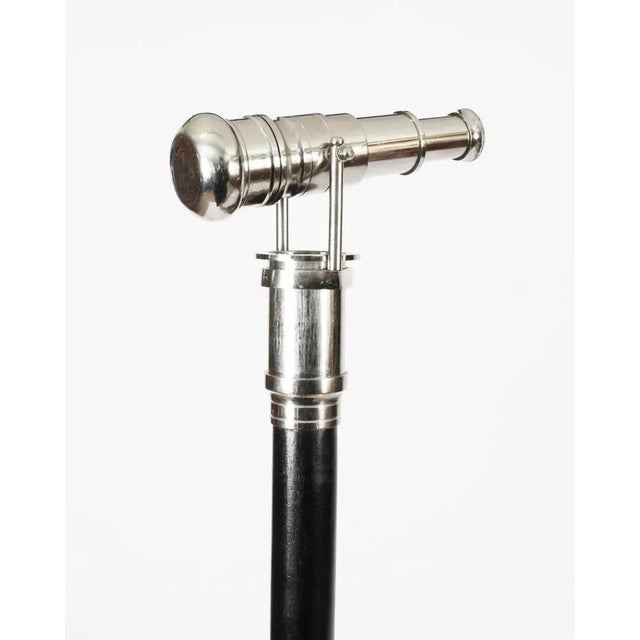 This is a beautiful vintage telescope walking stick by Dolland London, late 20th century in date. The striking stick...