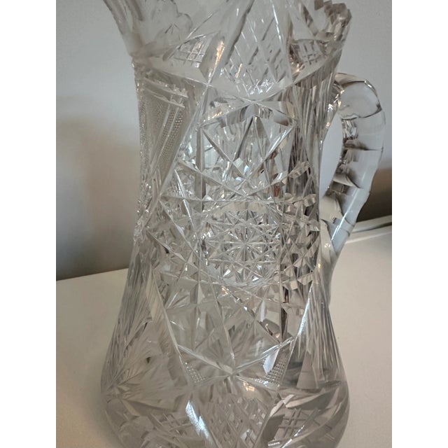 Beautiful and substantial American brilliant cut crystal water pitcher. Very elegant!! The design and pattern indicates it...