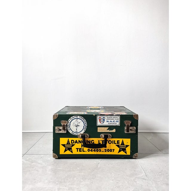 This rare, highly decorative dj case dates from the 1960s/70s and is adorned with various stickers. the stickers depict...