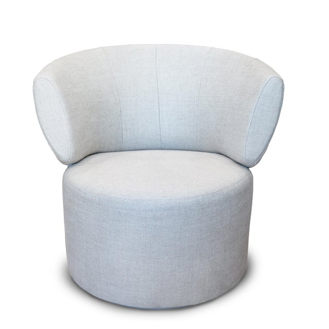 Rolf Benz swivel chair reupholstered in Belgian linen fabric. This vintage swivel chair, designed by Katja Reitner and...