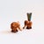 A set of 2 adorable Mid Century elephant toothpick holders. Lovely natural grain to the wood. A hole is formed in the...
