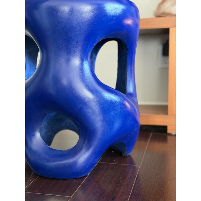 The Made Goods Hyde stool in a rare, one-of-a-kind glossy cobalt blue finish—an elevated variation of the classic Hyde...