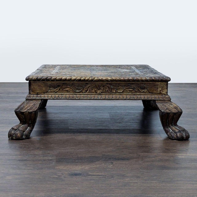This coffee table was made by a furniture maker in Northern California. It features a unique, hand-carved wood and metal...