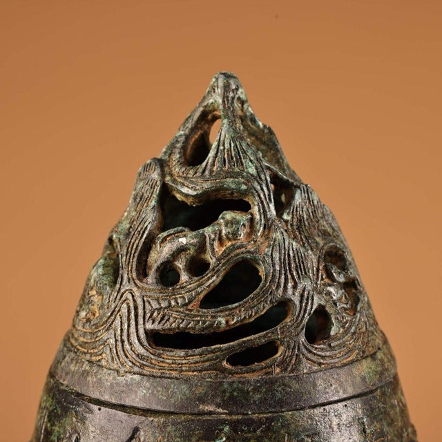 This matching pair is masterfully crafted from solid bronze with a rich, mottled green and brown patina. They feature...
