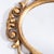 Carved Italian giltwood mirror, intricately cut frame. Bright and stands out in any setting.