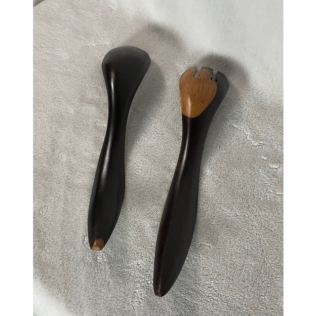 Unique 1960’s Danish Mid Century Modern beautifully made salad serving spoon and fork crafted of genuine rosewood with...