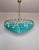 Elegant Italian pendant light made from 185 Turquoise Murano glasses "poliedri". Structure in gold and brass colored...