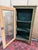 Venetian Painted Wooden Display Cabinet Three glass sides Decorated with ribboned foliage Spindle legs