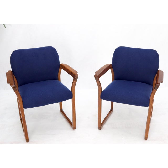 Danish Mid-Century Modern blue wool upholstery teak armchairs.