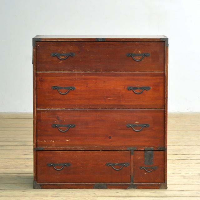 Traditional Japanese Tansu chest of drawers from the 1870s. Manufactured during the late Meiji era (1868-1912). This piece...