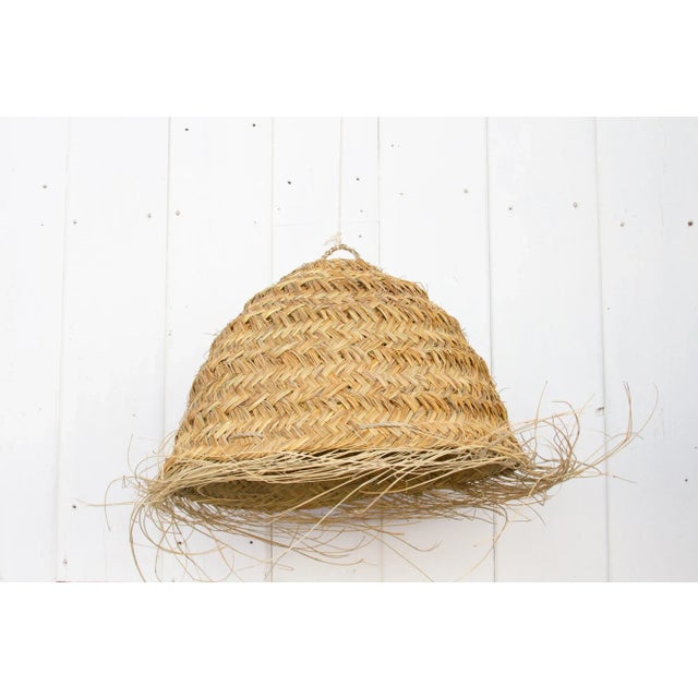 Finely braided by artisans in Fez, this handmade pendant are made of palm leaves. This beautiful lantern are perfect for...