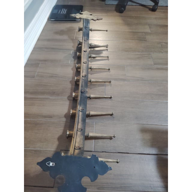 This is a vintage Hanukkah Menorah Candle or Wall Candelabra from the 1970's. The candelabra has 9 arms ornate MCM Wall...