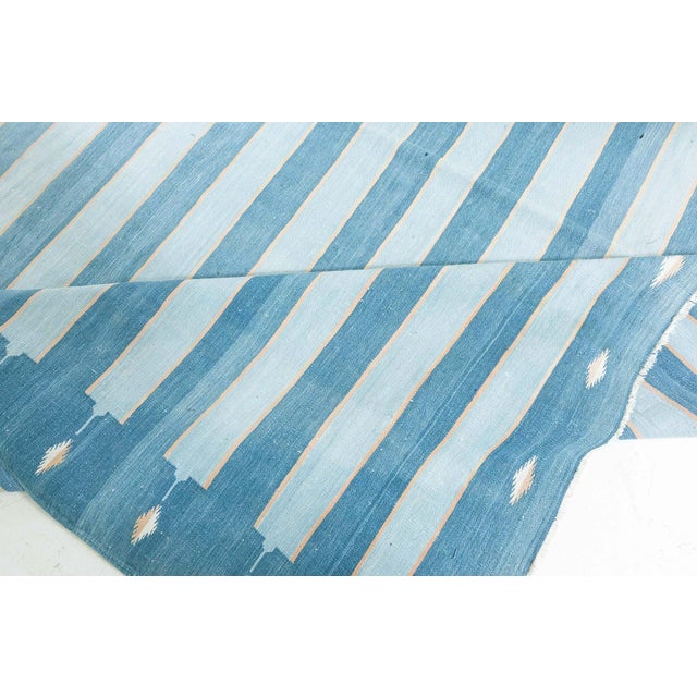 Vintage Indian Dhurrie Striped Blue Rug Size: 8'3" × 14'1" (251 × 429 cm) The vintage Dhurrie before your eyes is simple...