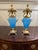 A refined and elegant pair of antique French turquoise blue opaline urns, richly mounted in gilt bronze (ormolu), dating...