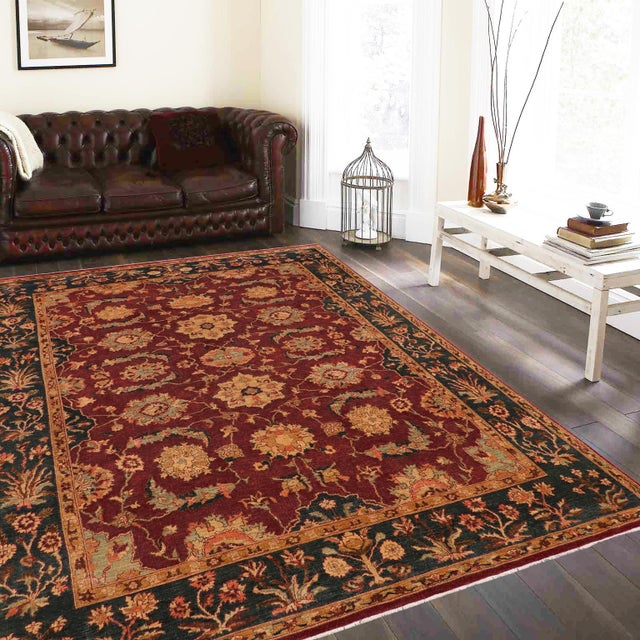 "Enhance the ambiance of your home with this magnificent Persian-influenced Turkish hand-knotted rug made by skilled...