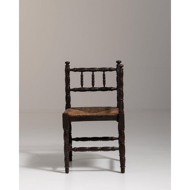 20th Century France Weathered Dark Oak Rush-Seated Spindle-Back Chair For Sale In Greensboro - Image 6 of 11