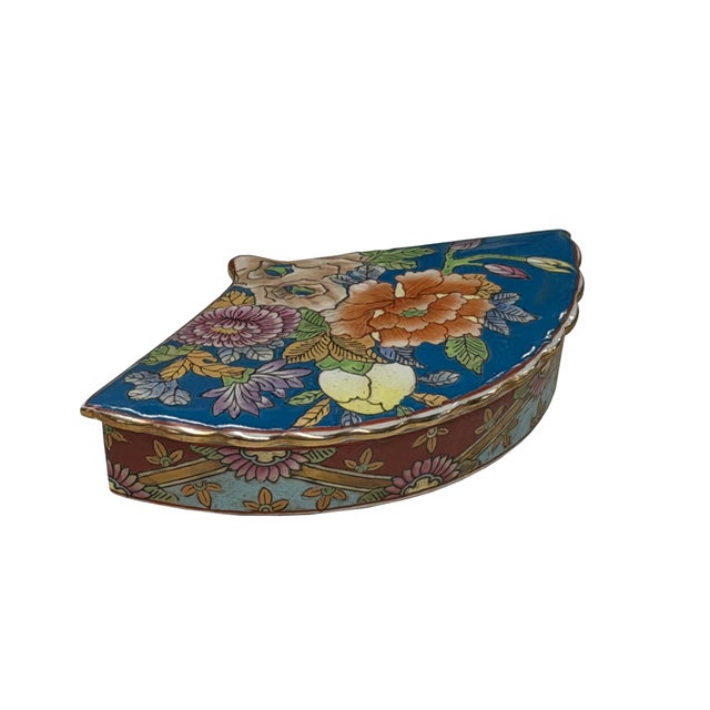 Crafted in an elegant fan shape, this vintage ceramic box features a rich, vibrant blue glaze across the lid, beautifully...