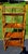 Antique Victorian burnt bamboo etagere featuring four wooden tiers. Design and Materials • Frame: Crafted from...