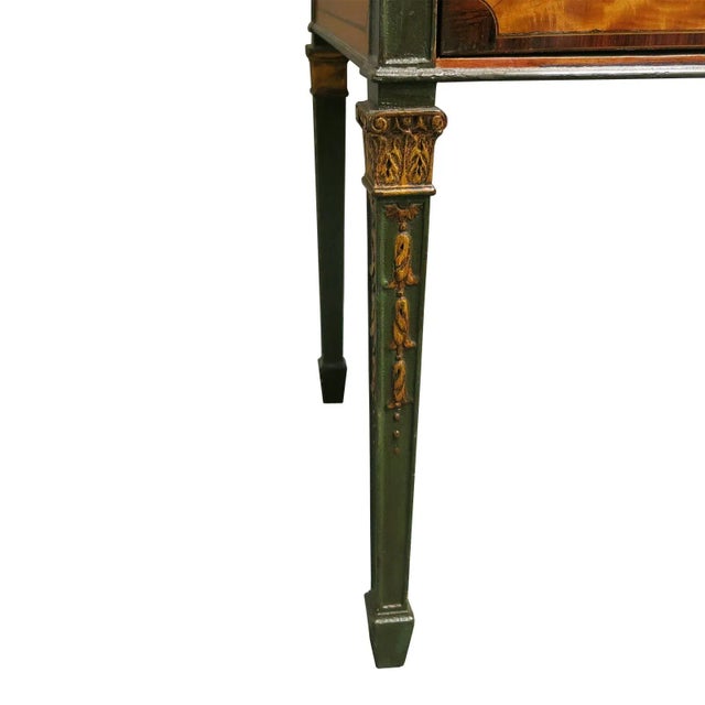 A fine and rare English late eighteenth century George III painted satinwood side cabinet. The square top with luminous...