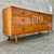 Vintage Mid Century Modern Sculptural Harlekin Style Nine Drawers Dresser. Circa 1960s Features a Harlekin Inspired design...