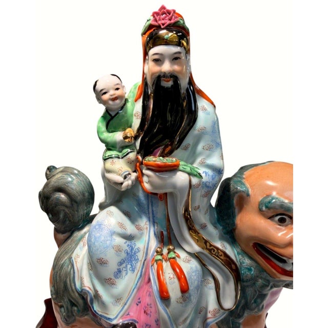 Chinese Vintage Chinese Porcelain Immortal W/Child Riding Foo Lion Statue 15" Mark 082 For Sale - Image 3 of 16