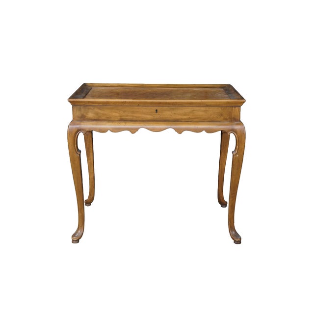 This exceedingly rare pair of vitrine-style accent tables by Baker Furniture represents a masterclass in American cabinet...