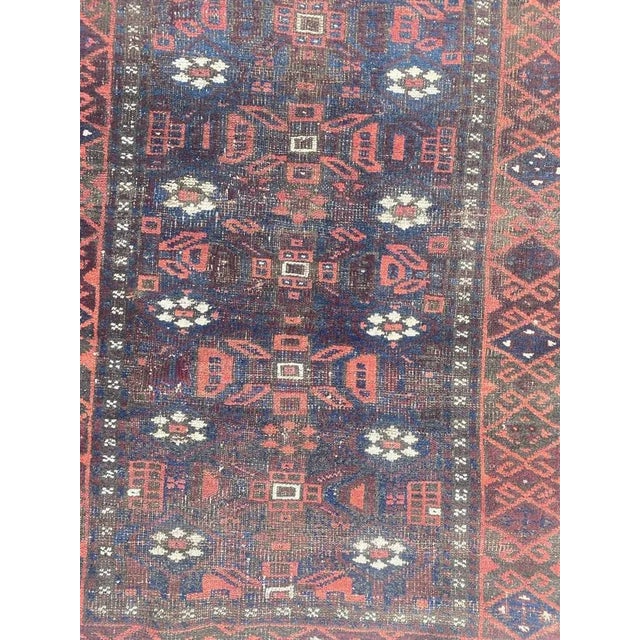 Nice late 19th century Turkmen Afghan Baluch rug with beautiful tribal design and nice natural colors, entirely hand...