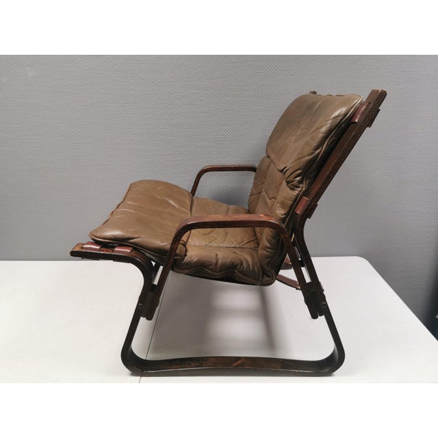 A gorgeous bentwood and buffalo leather lounge chair by Giske Carlsen for Kleppe Møbelfabrik in Norway 1970s. The sturdy...