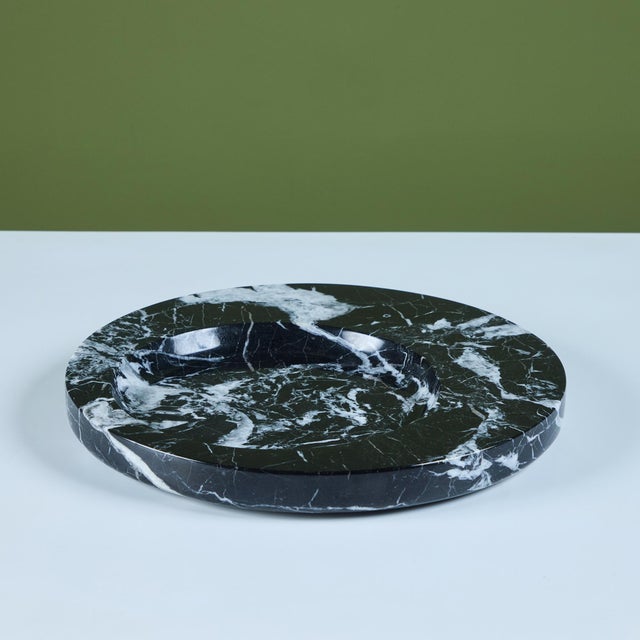 Round stone dish in a stunning Nero Marquina marble with white veining in the style of Angelo Mangiarotti. The dish...